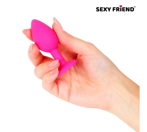 Розовая силиконовая анальная втулка с фиолетовым кристаллом - 7,3 см.