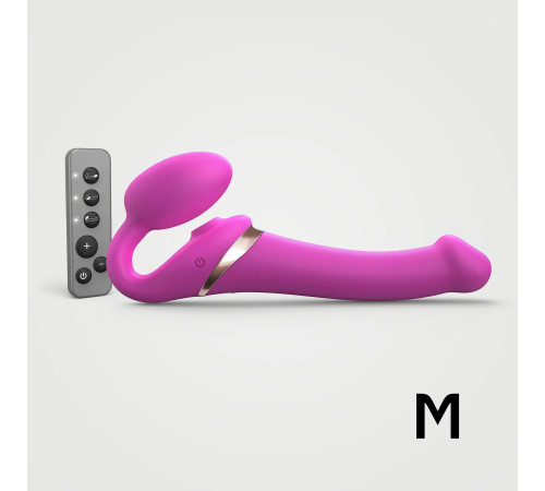 Ярко-розовый безремневой страпон Multi Orgasm Size M с клиторальной стимуляцией