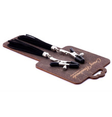 Зажимы на соски с черными замшевыми кисточками