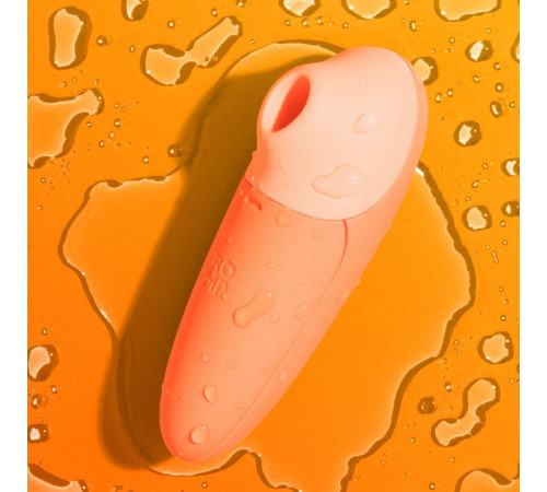 Оранжевый бесконтактный клиторальный стимулятор Romp Switch X