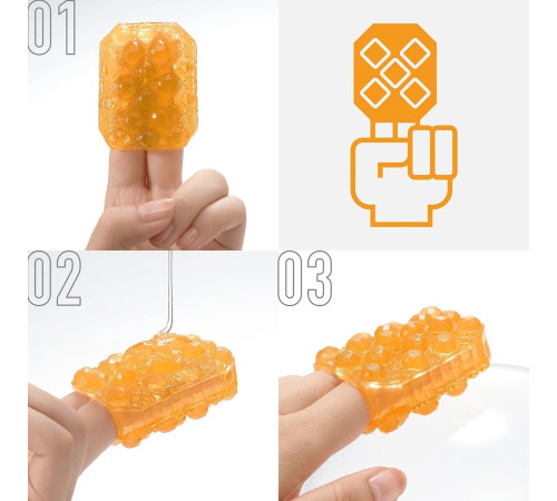 Оранжевый мастурбатор-стимулятор Tenga Uni Topaz