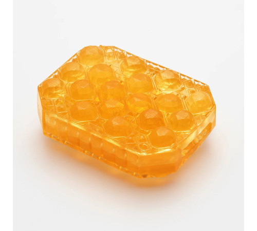 Оранжевый мастурбатор-стимулятор Tenga Uni Topaz