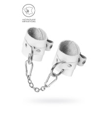 Белые мягкие кожаные наручники с люверсами