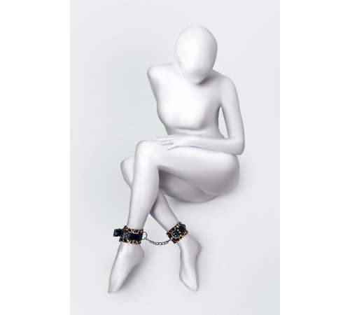 Оковы Anonymo с анималистическим принтом