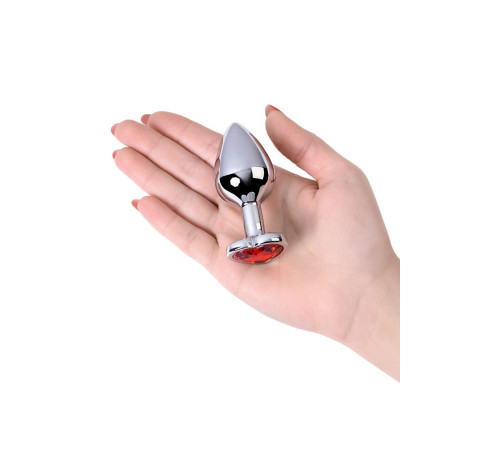 Серебристая коническая анальная пробка с красным кристаллом-сердечком - 7 см.