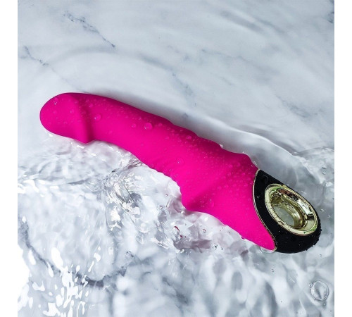 Ярко-розовый рельефный вибратор-реалистик - 22,5 см.