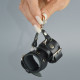 Черный кожаный брелок в виде наручников